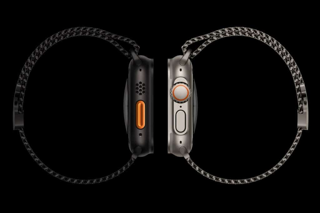 A close-up of the Apple Watch Ultra 3 on a wrist, showcasing its titanium enclosure and vibrant display, set against a rugged outdoor background with mountains, highlighting its adventure-ready design and advanced health features like hypertension detection.